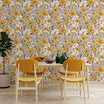 Yellow floral wallpaper styled in a bright dining space with warm wood furniture