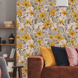 Marilla Yellow Floral wallpaper creating a cheerful accent wall in a cozy living room