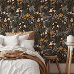 Dark botanical wallpaper adding warmth and depth to a modern neutral interior