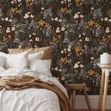 Dark botanical wallpaper adding warmth and depth to a modern neutral interior