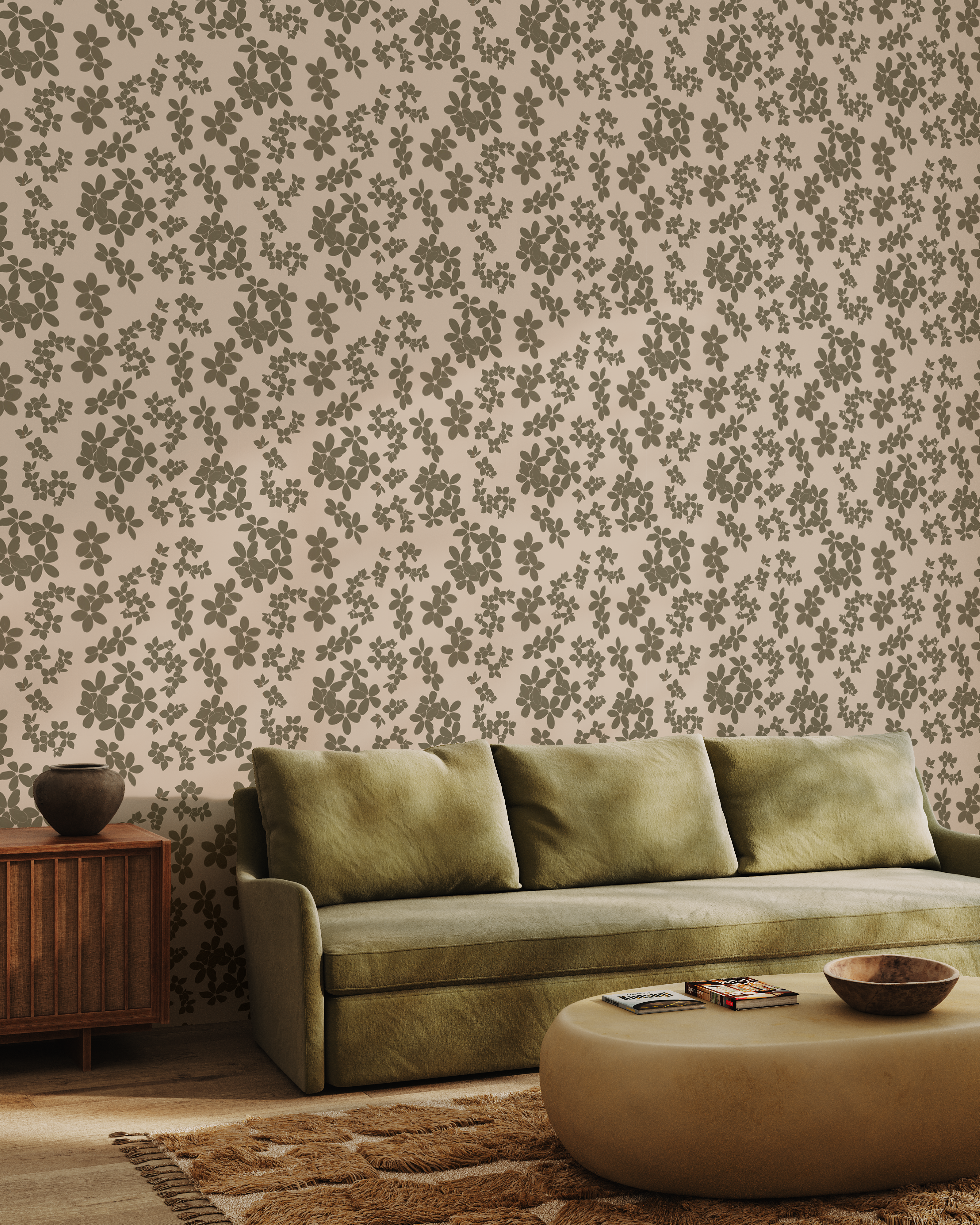 Earthy brush stroke floral wallpaper styled in a living room with green sofa and natural wood accents