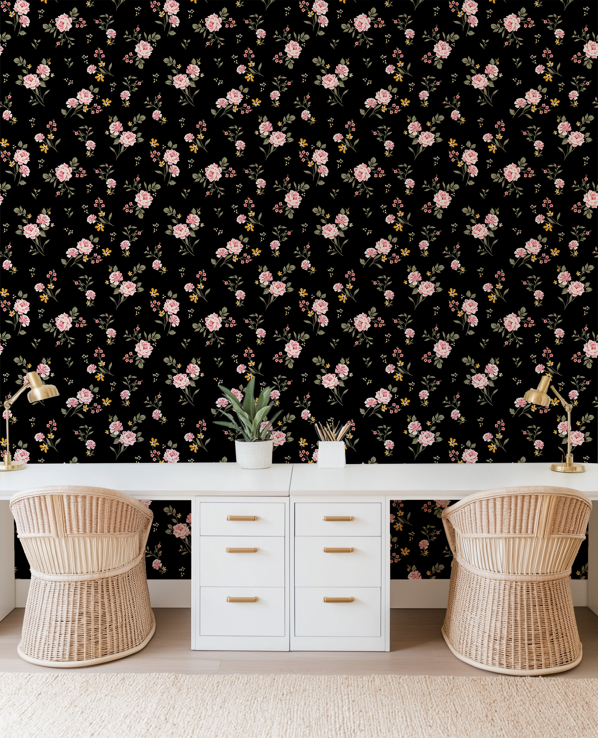 Moody black and pink floral wallpaper with vintage-inspired roses styled in a bright home office with white desks and rattan chairs.