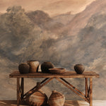Old world wall mural styled with rustic pottery and wooden console table