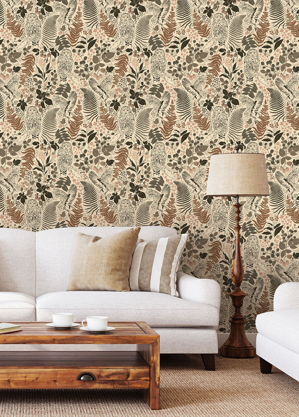 Neutral woodland owl wallpaper styled in a cozy living room with natural wood furniture