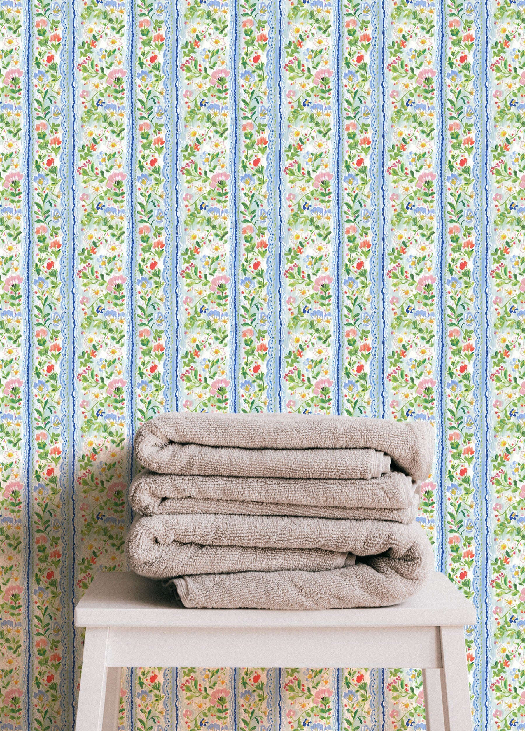 Vintage inspired floral stripe wallpaper with soft blue borders and cottage garden flowers