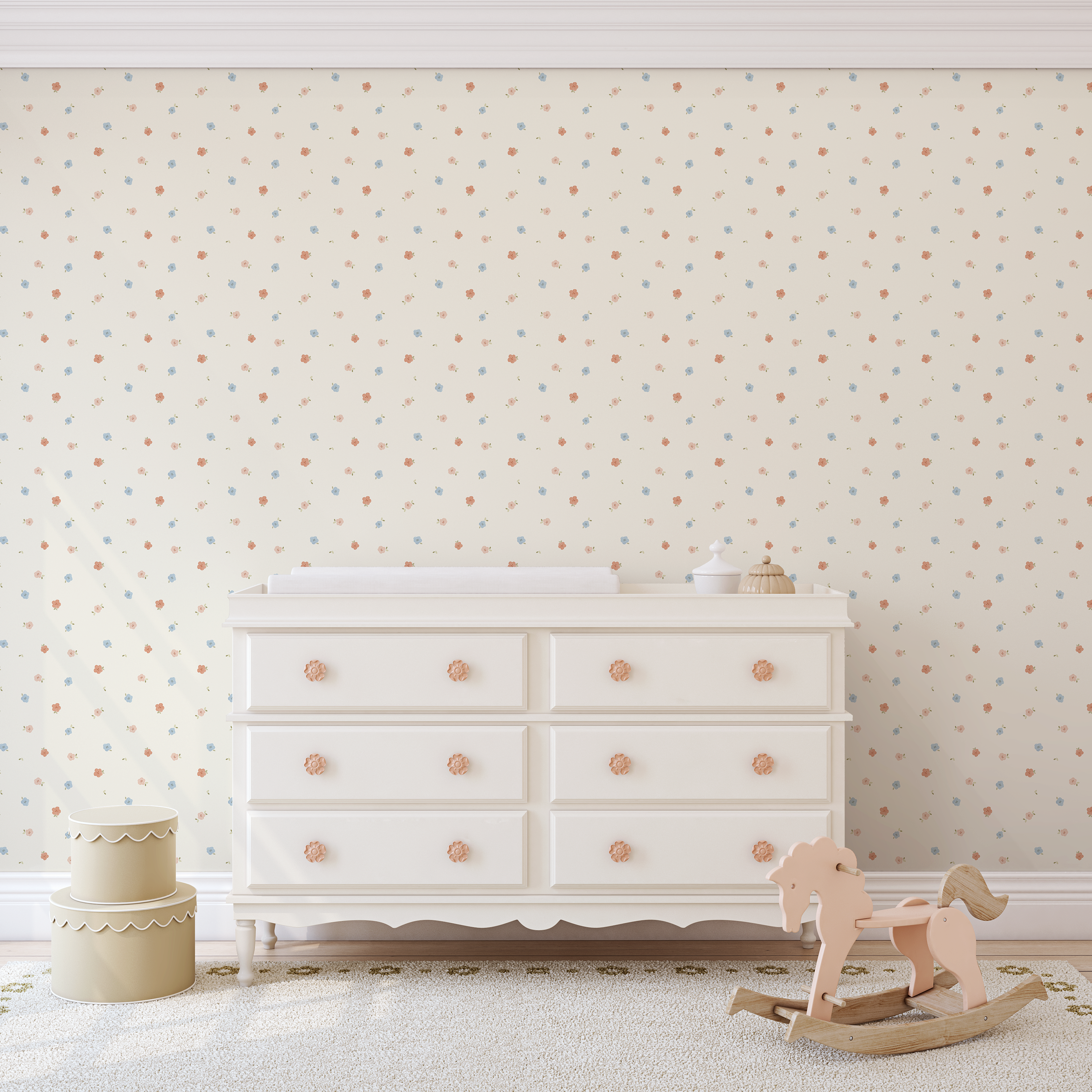 soft pastel floral wallpaper in neutral nursery with white dresser and flower knobs