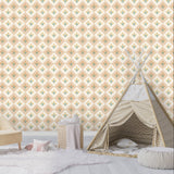 Children's room with a floral diamond wallpaper, sofa, teepee, and soft rug.