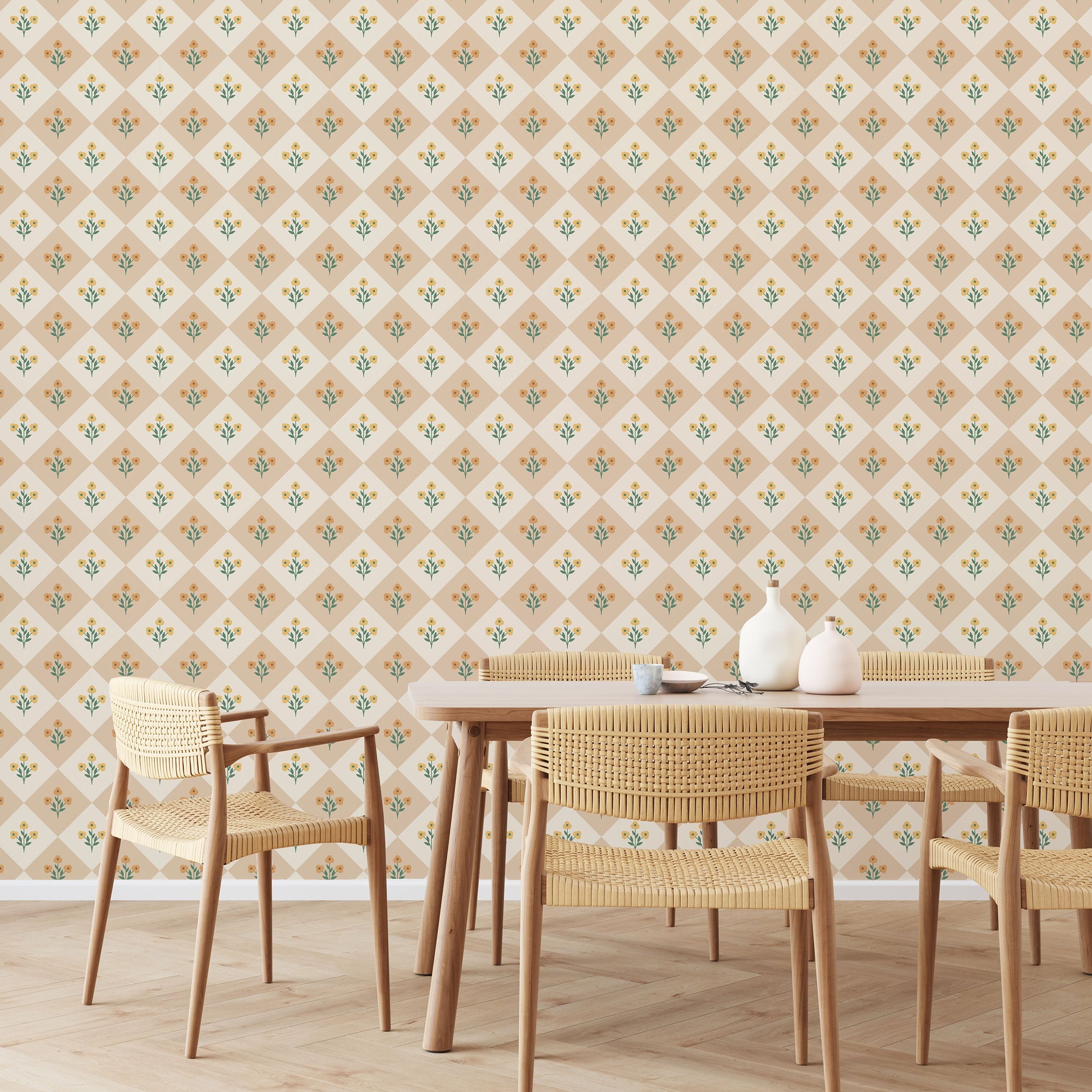 Dining area with wooden table and chairs against a floral diamond patterned wallpaper.