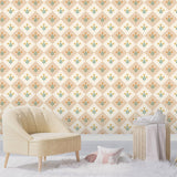 Beige armchair in a room with diamond floral patterned wallpaper