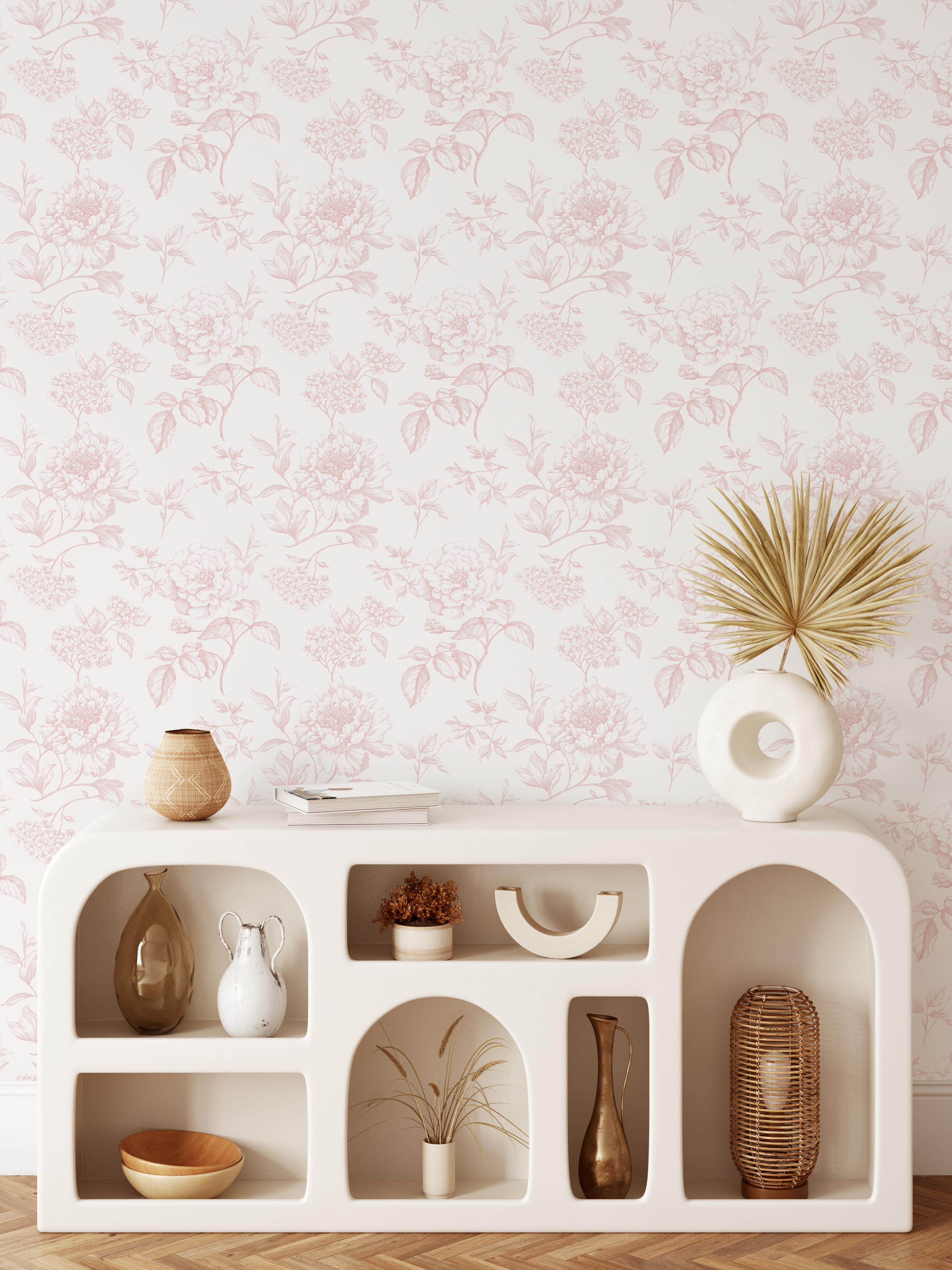 Light pink botanical toile wallpaper styled with neutral decor and modern sculptural shelving