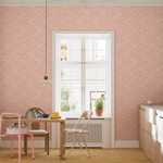 Full wall view of Bloomfield wallpaper in light-filled dining nook with natural wood table