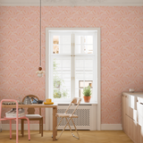 Full wall view of Bloomfield wallpaper in light-filled dining nook with natural wood table