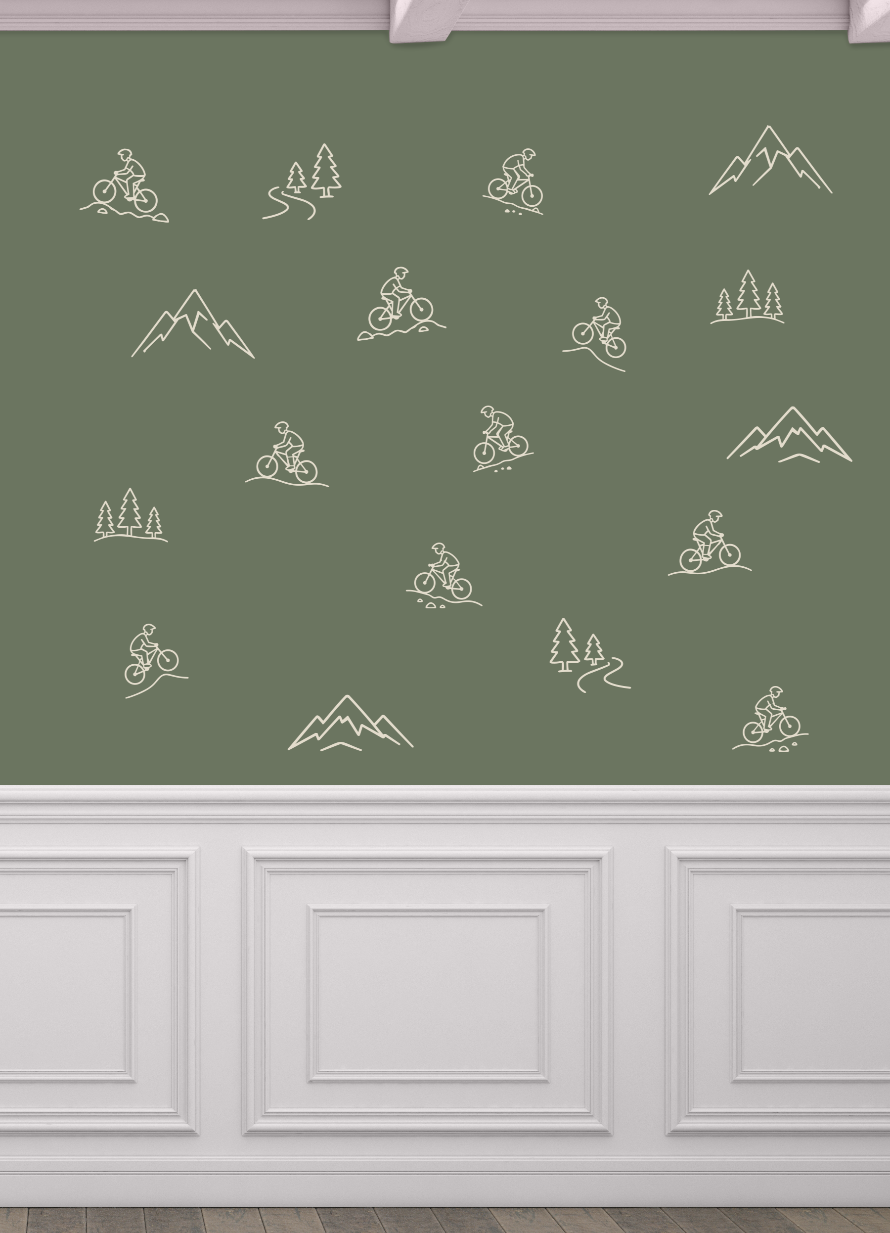 Simple mountain bike outline wall decals in white on a sage green accent wall featuring mountain biking, pine trees, and mountain icons.