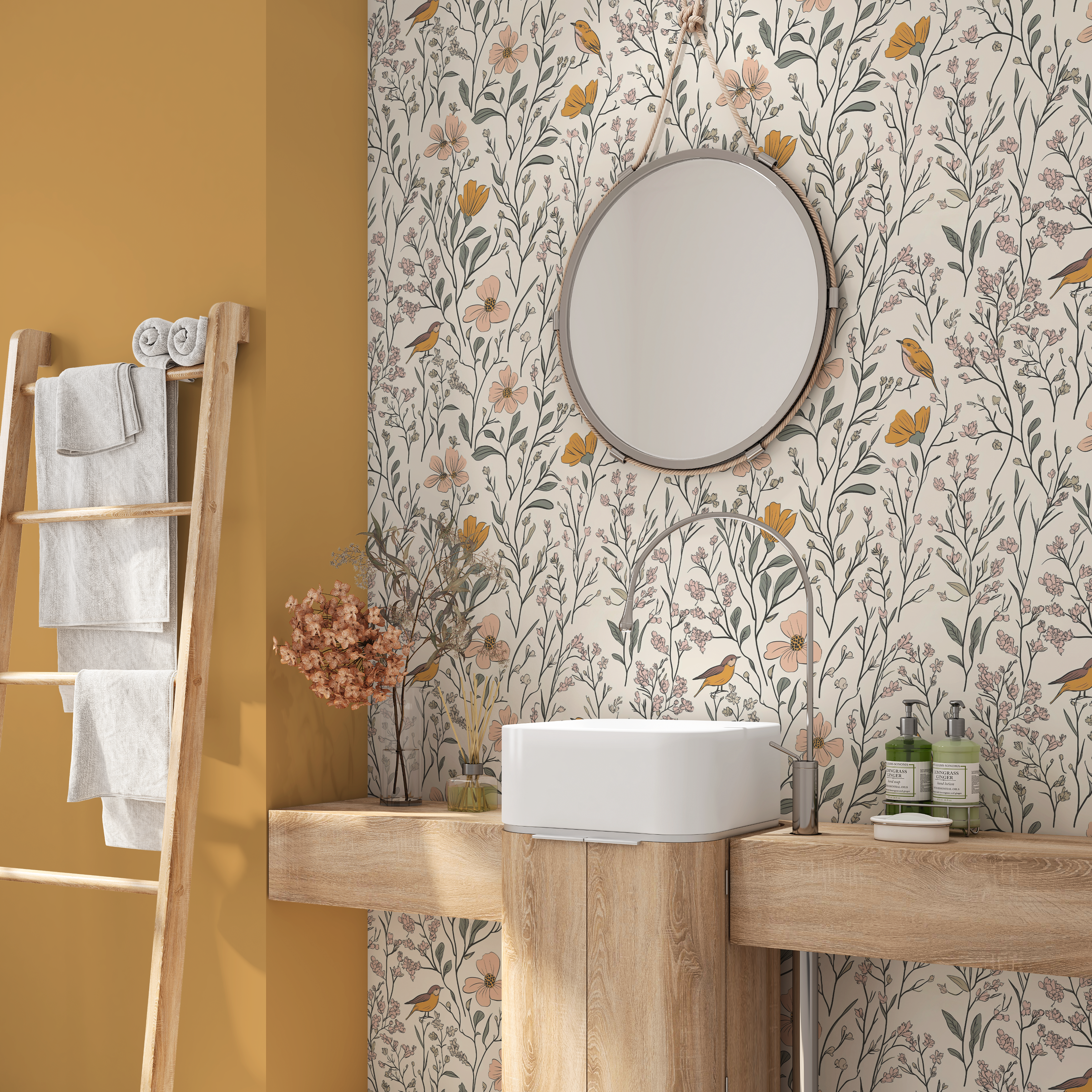 Bathroom with Songbird Meadow wallpaper behind a round mirror, wood vanity, and mustard wall