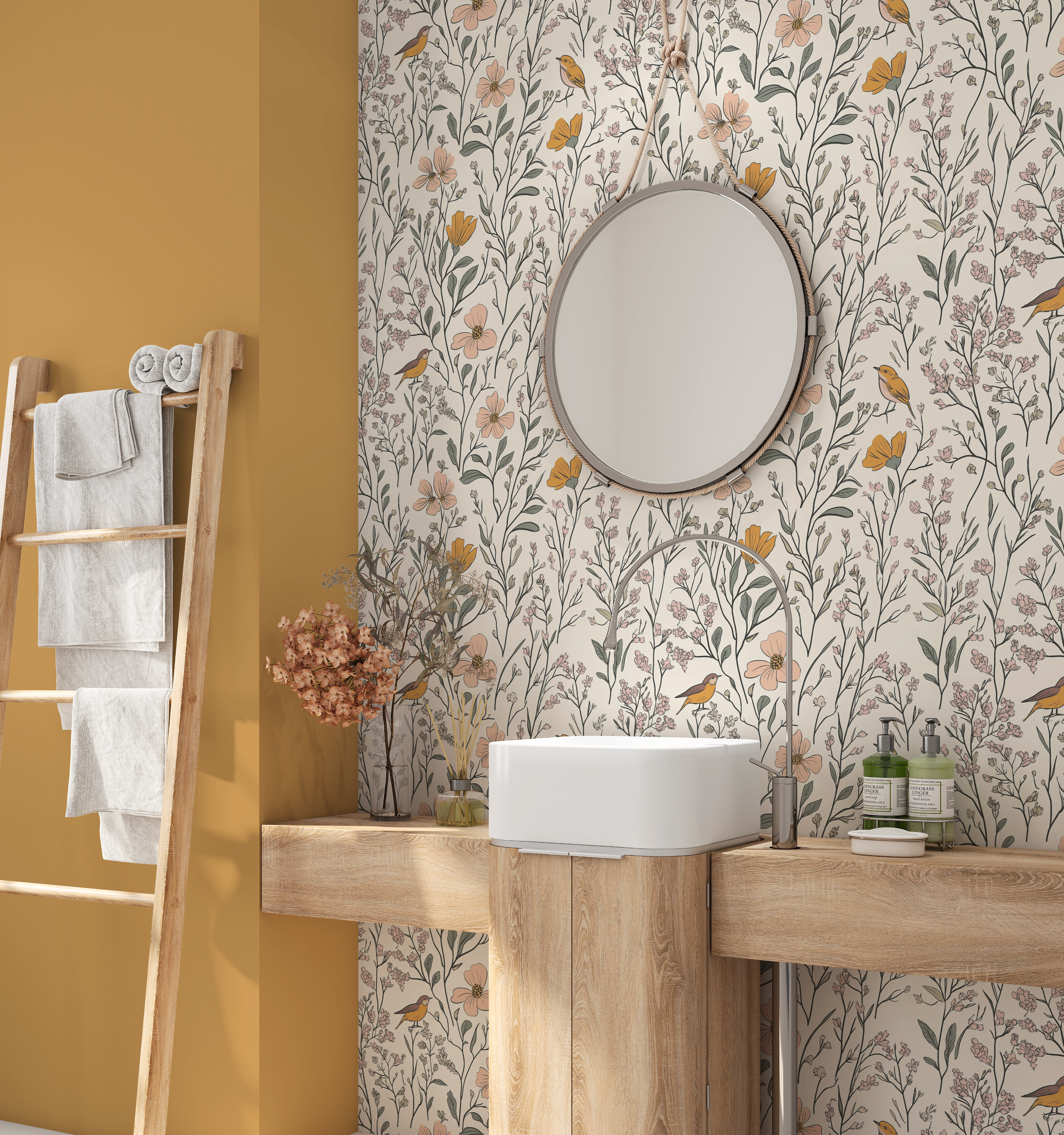 Bathroom with Songbird Meadow wallpaper behind a round mirror, wood vanity, and mustard wall