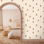 Strawberry wallpaper installed on an arched doorway and soft neutral bedding