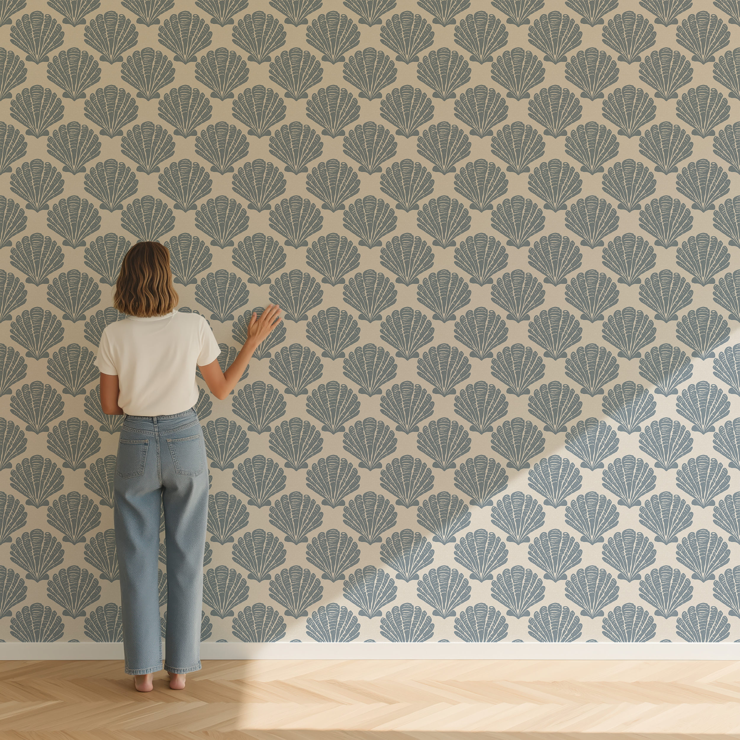 Installation scale reference of Tidepool Shell wallpaper showing the repeating blue seashell pattern on a neutral background.
