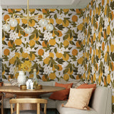 Tuscan Orange wallpaper installed in a breakfast nook with a round wood table and upholstered bench seating