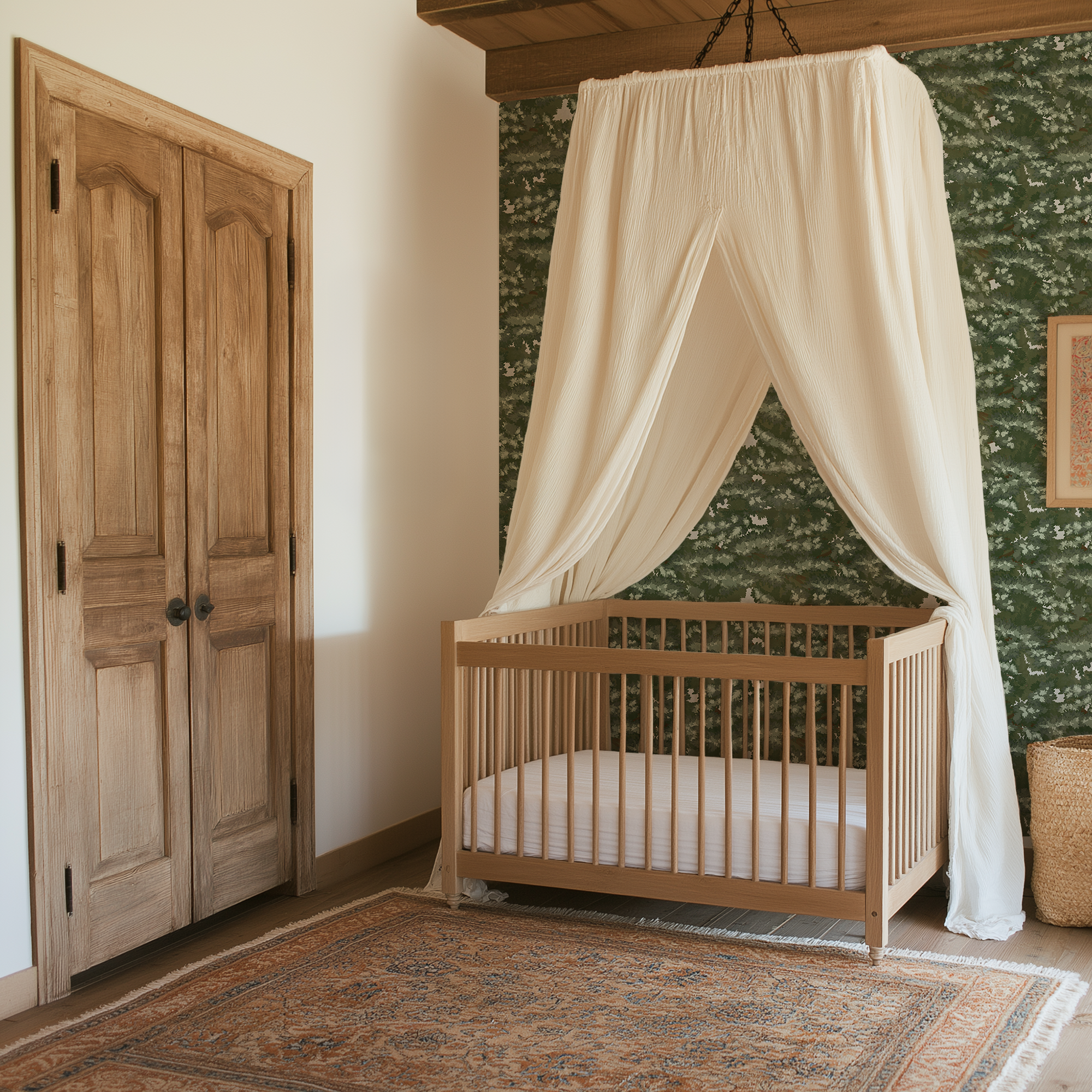 Verdure woodland wallpaper behind a light wood crib with canopy in a rustic vintage nursery