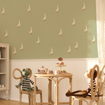 Neutral nursery wallpaper with geese pattern above wainscoting, vintage-inspired kids room decor