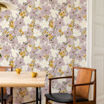 Viola Purple wallpaper in a dining space with brass pendant light and view into an adjacent living room