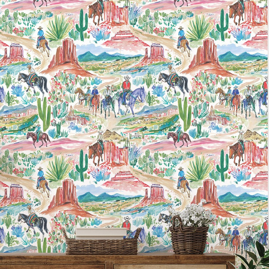 western desert landscape wallpaper with riders, mountains, and cactus illustration