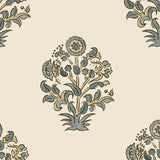 Close-up of classic block print floral pattern in blue and neutral tones on premium wallpaper material