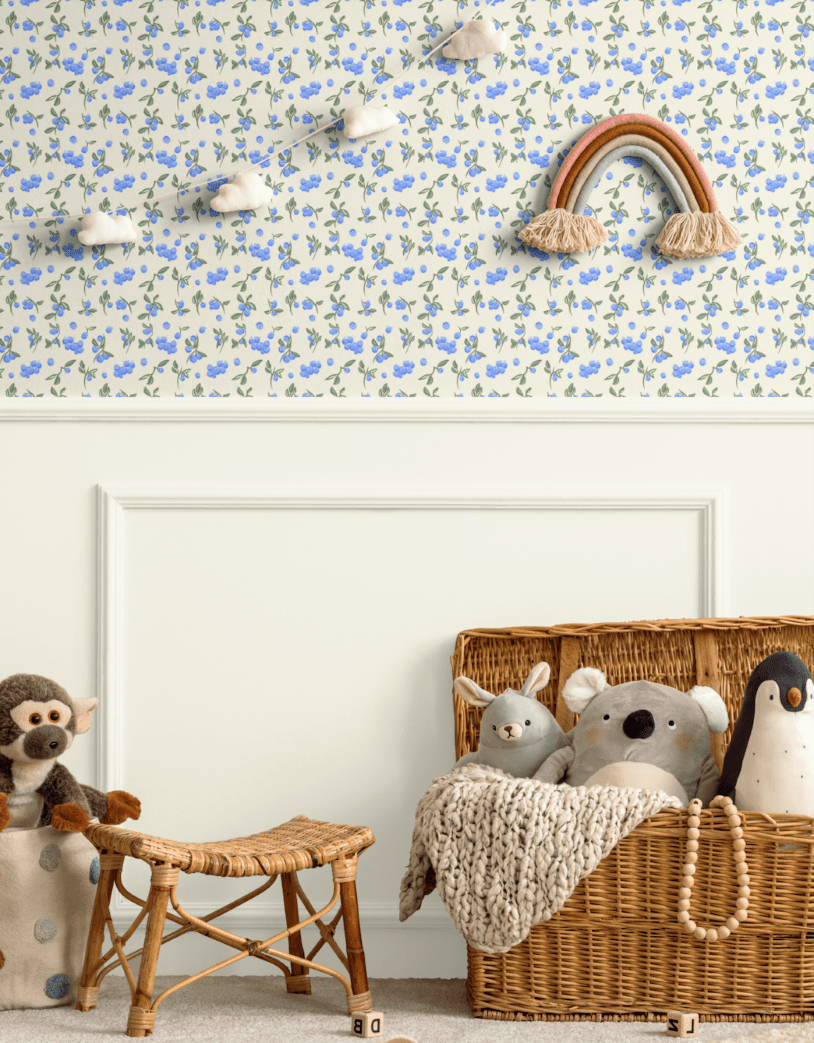 Nursery setup with Blueberry Fields wallpaper on an accent wall, creating a whimsical floral theme ideal for kids’ rooms or playrooms