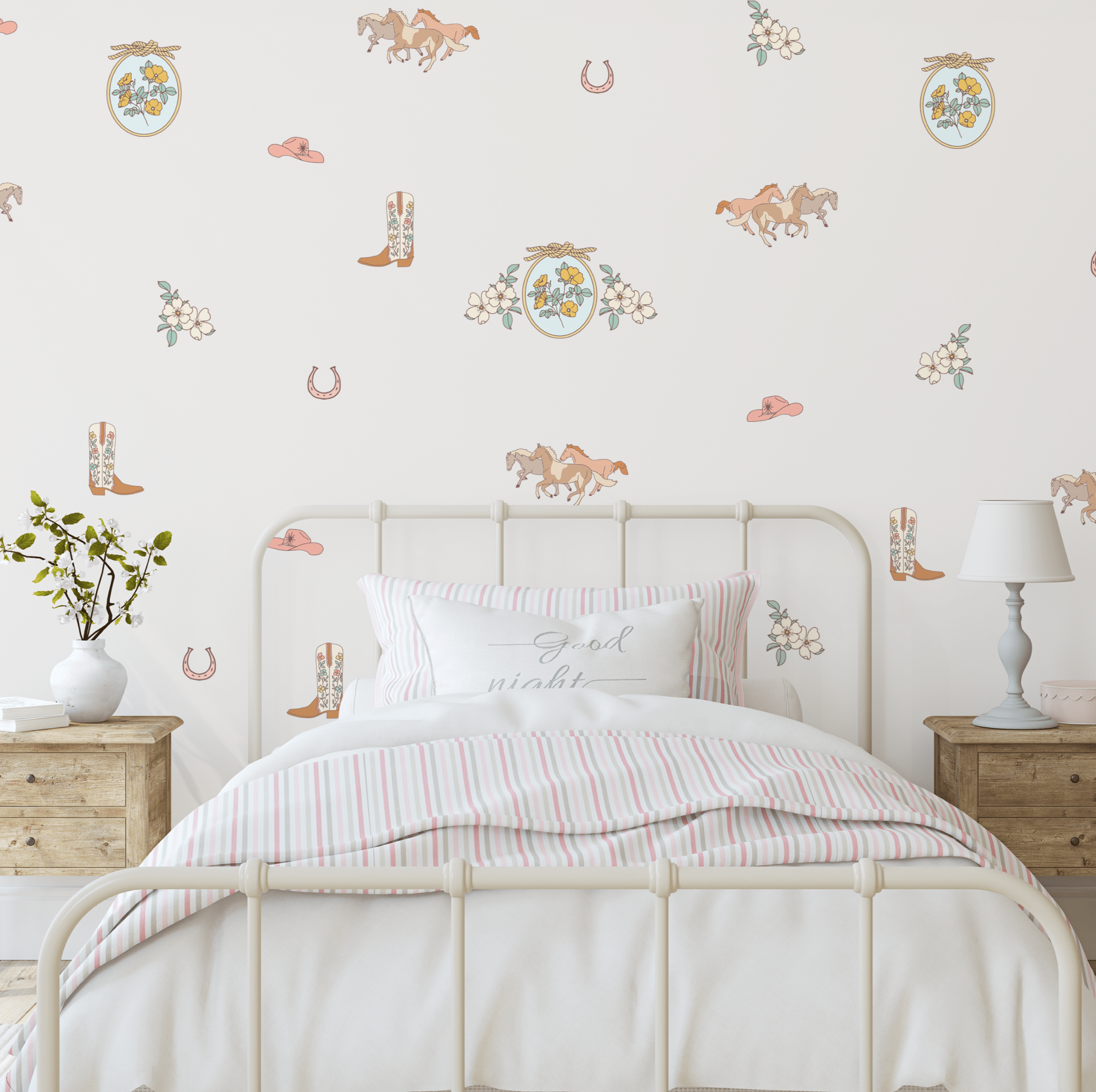 Western wall stickers with floral motifs, horses, and cowboy hats in a soft, pastel-themed nursery