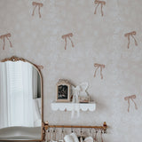 Beautifully styled pink bow wallpaper with vintage pink accents.