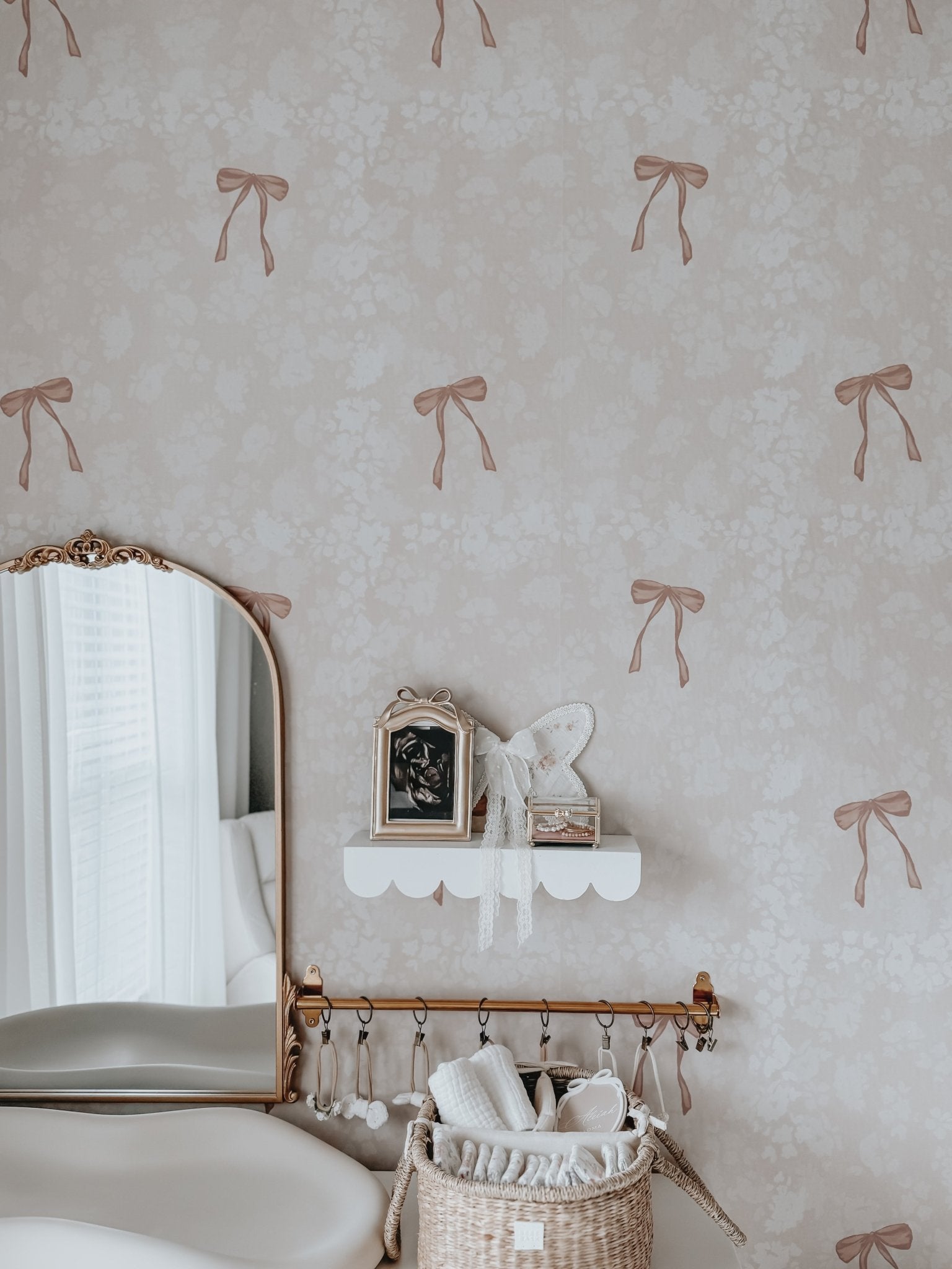 Beautifully styled pink bow wallpaper with vintage pink accents.