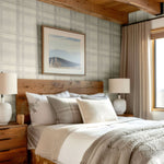 Modern rustic bedroom with Cream Tartan Wallpaper and cozy linens.
