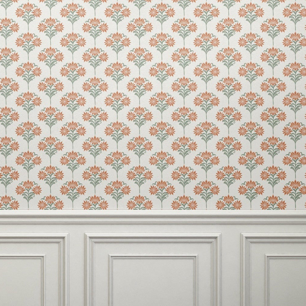 Close-up view of floral damask wallpaper showcasing intricate orange and green floral patterns.