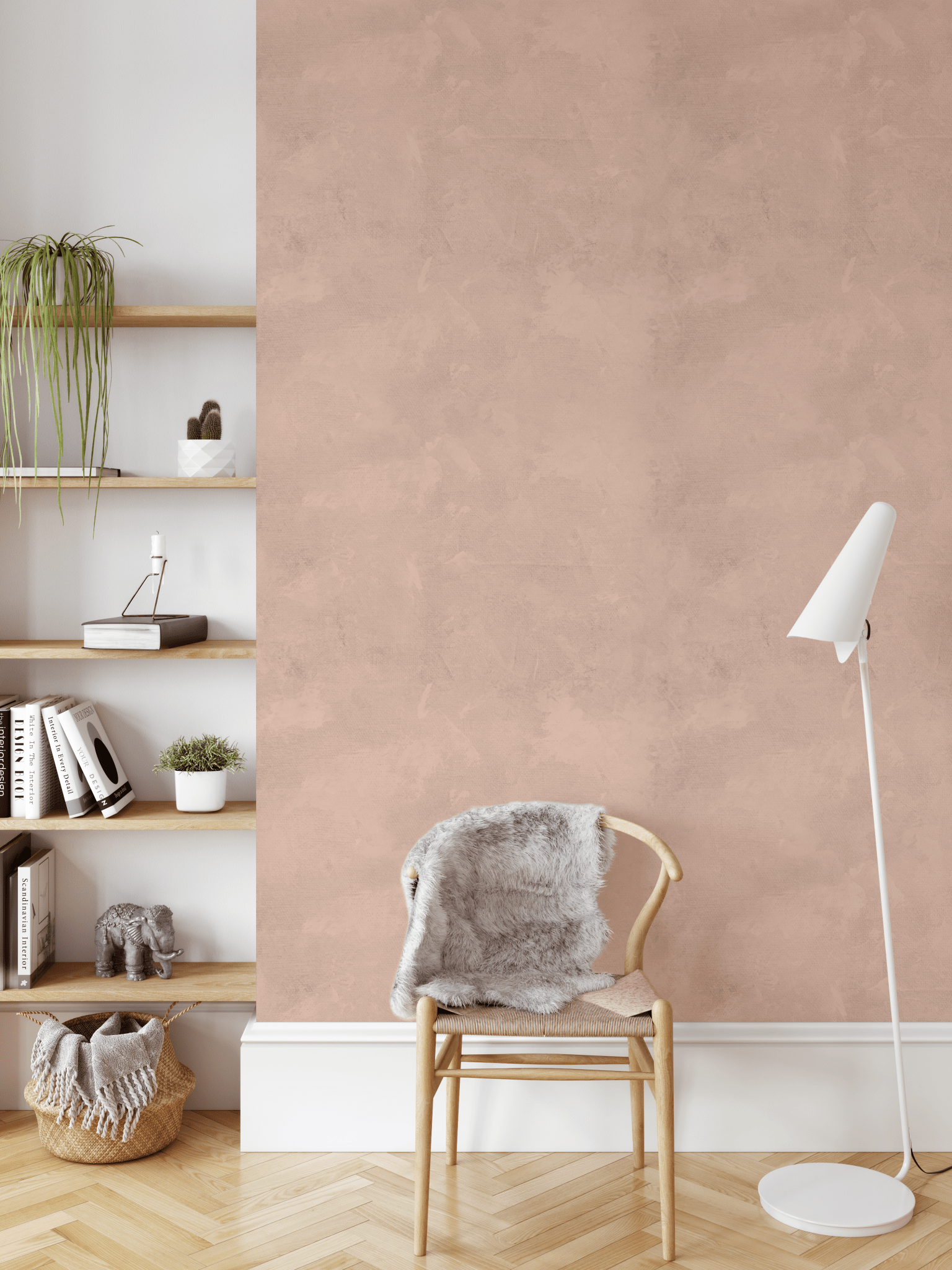 Accent wall with dusty rose pink limewash wallpaper, paired with modern wooden shelves and a cozy chair in a calm reading nook