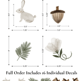 Size guide for Enchanted Rabbit wall decals, displaying individual measurements for each element, including bunnies, leaves, and flowers