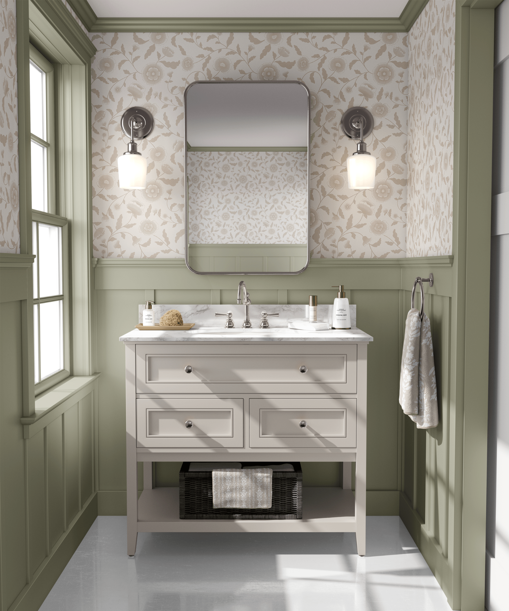 Elegant bathroom with faded blush neutral wallpaper featuring a subtle floral design above green wainscoting.