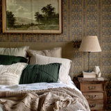 Folksy Wallpaper in Rustic Bedroom with Cozy Bedding and Earthy Tones.