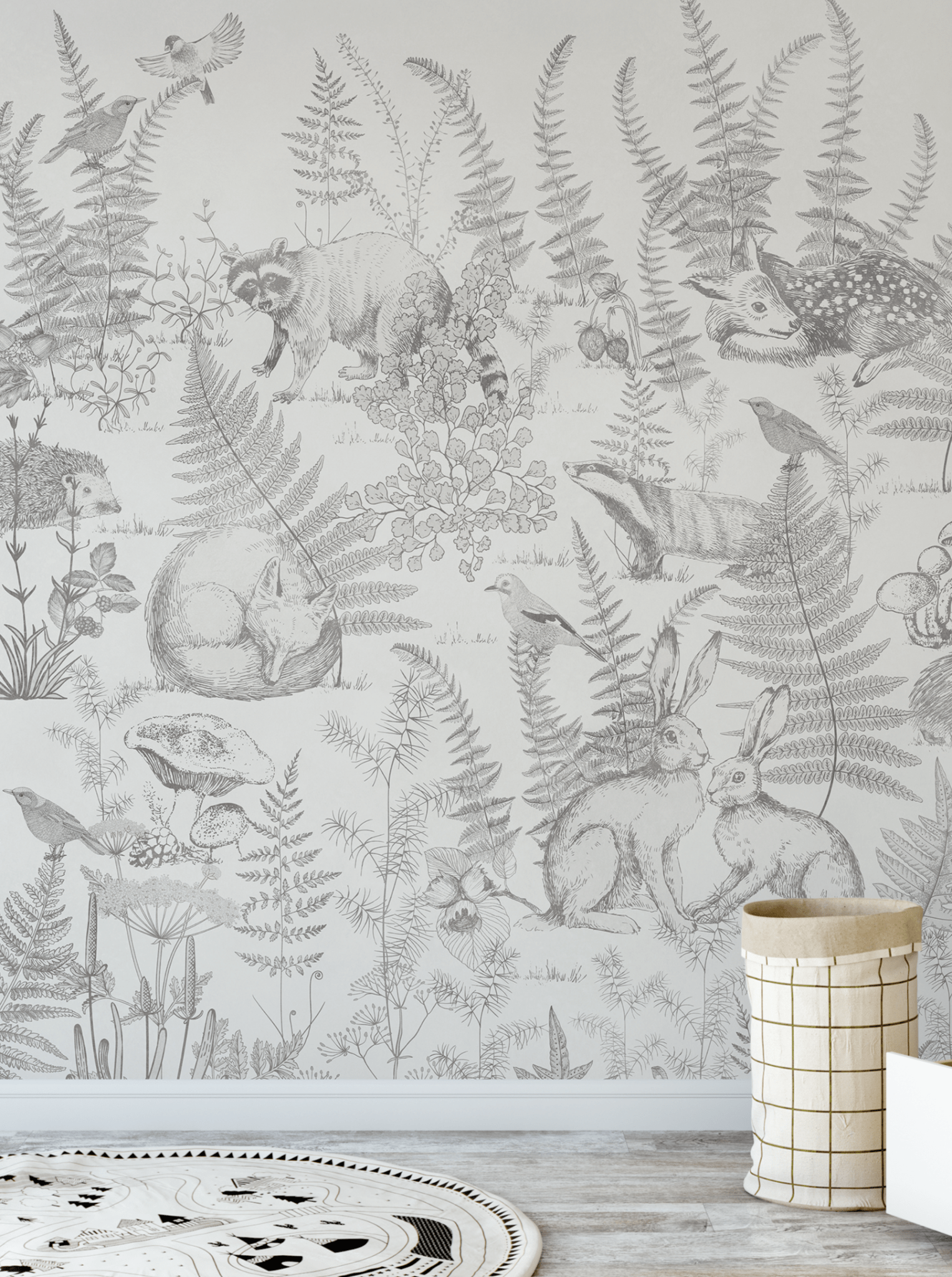 Close-up of a forest animal wall mural showing wildlife like raccoons, foxes, and rabbits surrounded by ferns and mushrooms for a whimsical touch