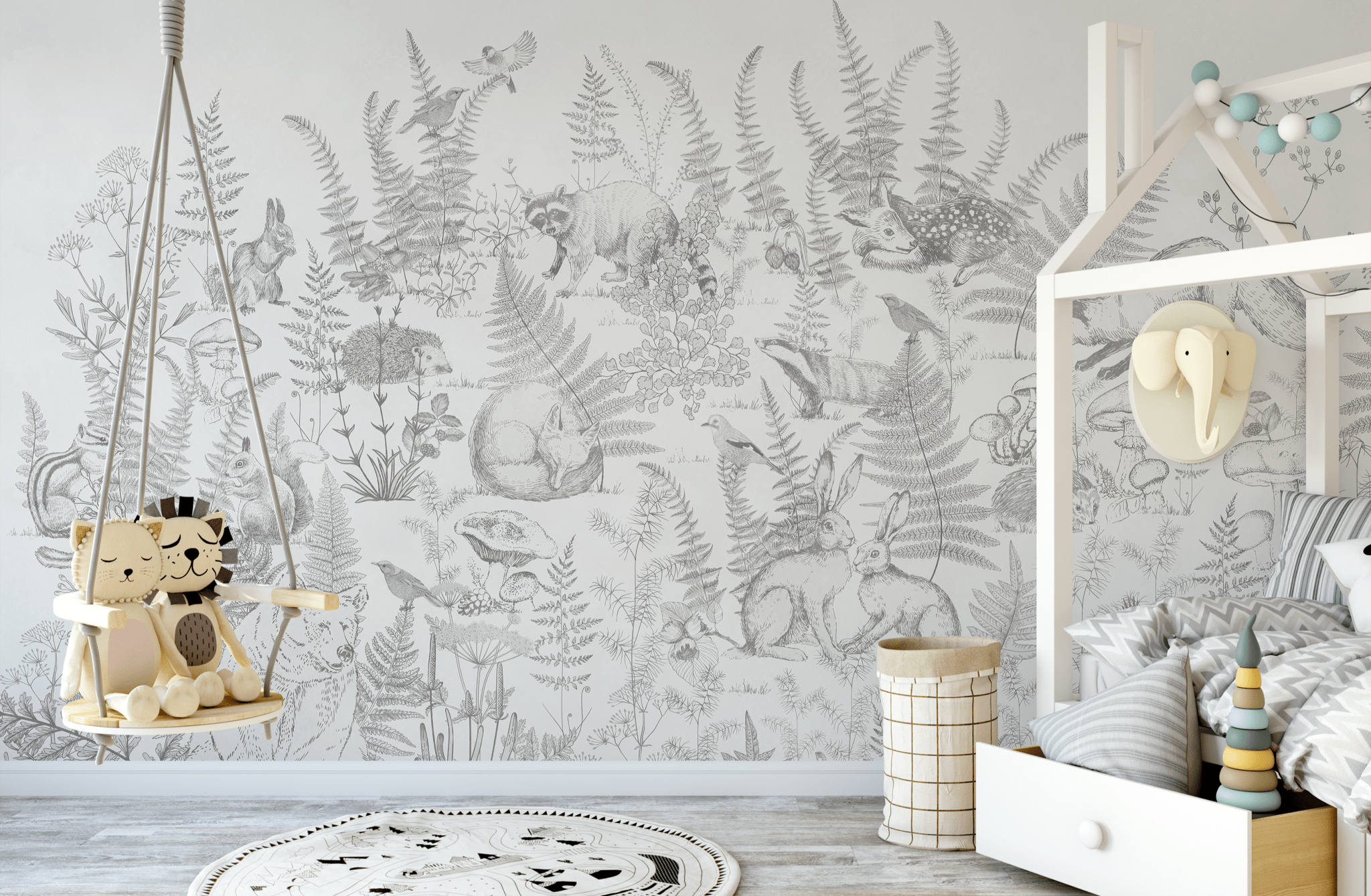 Kids' room featuring a detailed forest animal wall mural, with hand-drawn woodland creatures and plants, creating a nature-inspired atmosphere