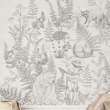 Detailed view of a forest animal wall mural with hand-sketched wildlife, including bears, birds, and rabbits, set in a nature-themed design