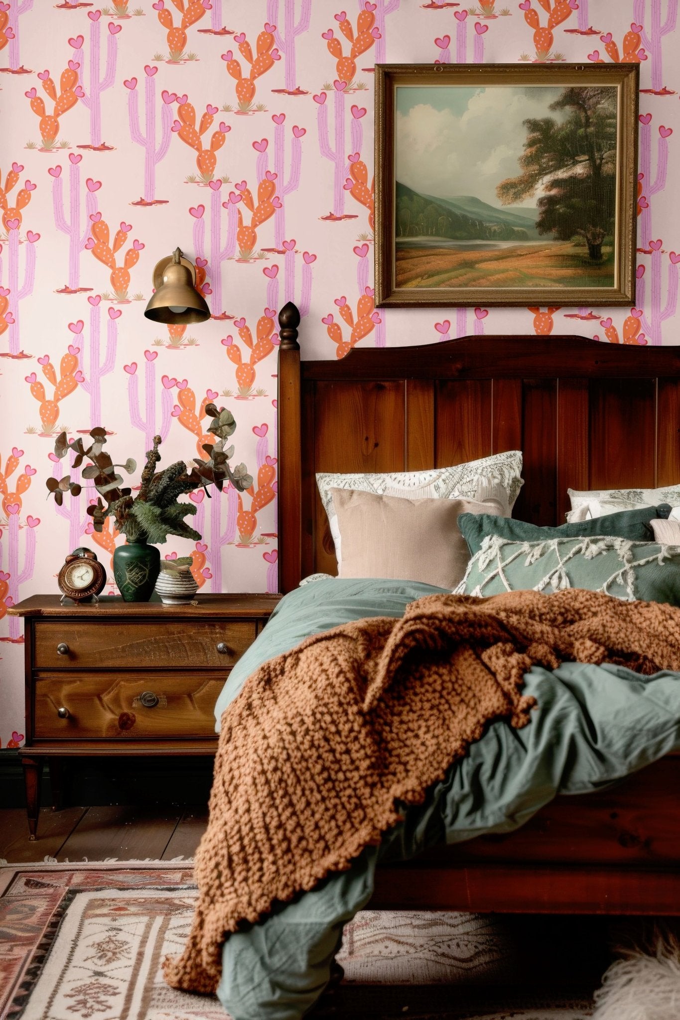 Classic bedroom with Western-style cactus wallpaper, vintage furniture, and warm textiles for a charming and nostalgic vibe