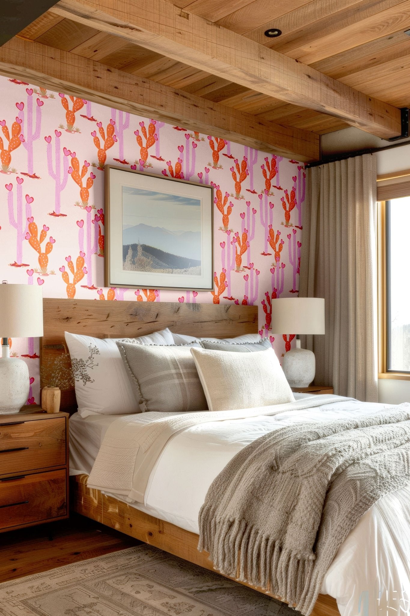 Light-filled bedroom showcasing a Southwest-style cactus wallpaper, neutral tones, and textured accents for a warm, inviting look