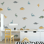 Dinosaur-themed homeschool room makeover with colorful wall decals, featuring various dinosaurs adding a playful and educational vibe