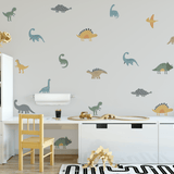 Dinosaur-themed homeschool room makeover with colorful wall decals, featuring various dinosaurs adding a playful and educational vibe