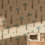 Dinosaur-themed nursery with neutral Scandinavian-style wallpaper. Watercolor palm trees create a playful, prehistoric backdrop for kids rooms, with peel-and-stick and traditional options