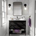 Bold black and white wallpaper in modern bathroom with double sconce lighting