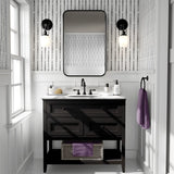 Bold black and white wallpaper in modern bathroom with double sconce lighting