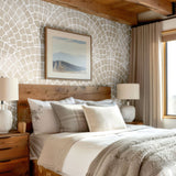 Cozy bedroom with Natural Mosaic Tile wallpaper, wooden beams, and neutral decor.