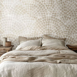 Natural Mosaic Tile wallpaper displayed in a rustic bedroom with beige bedding and wooden nightstands