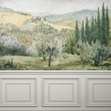 Cozy bedroom setting with Oil Painting Landscape Wall Mural showcasing green hills and cypress trees.